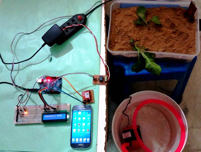 Whenever we go out of town for few days, we always used to worry about our plants as they need water on regular basis. So here we are making Automatic Plant Irrigation System using Arduino, which automatically provides water to your plants and keep you updated by sending message to your cell phone. In This Plant Watering System, Soil Moisture Sensor checks the moisture level in the soil and if moisture level is low then Arduino switches On a water pump to provide water to the plant. Water pump gets automatically off when system finds enough moisture in the soil. Whenever system switched On or off the pump, a message is sent to the user via GSM module, updating the status of water pump and soil moisture. This system is very useful in Farms, gardens, home etc. This system is completely automated and there is no need for any human intervention.