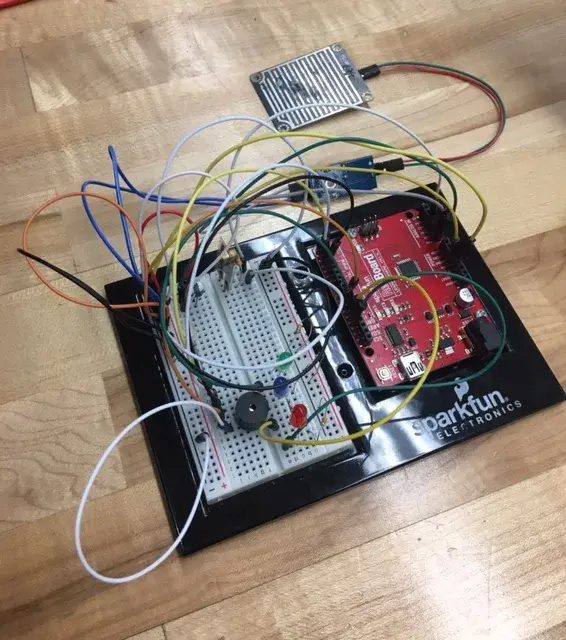 Using Temperature, Rainwater, and Vibration Sensors on an Arduino to Protect Railways